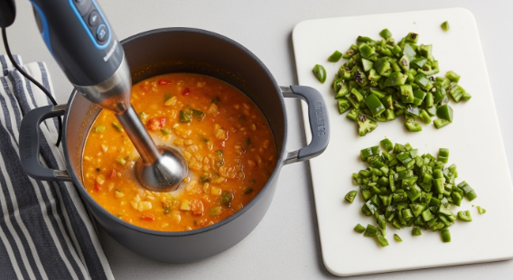 Partially blending chowder with poblanos ready to stir in