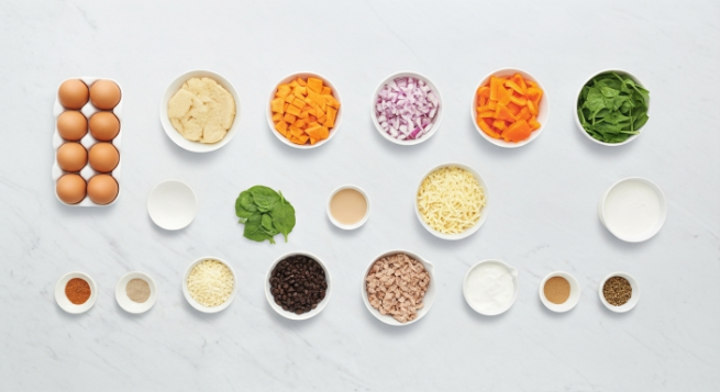 Ingredients for Halloween breakfast casserole arranged overhead