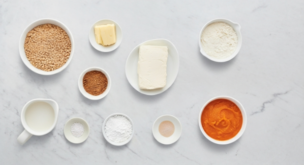 Ingredients for No-Bake Pumpkin Spice Cheesecake Cups arranged in bowls