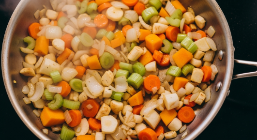 Sautéing fall vegetables for Italian Wedding Soup with Fall Vegetables