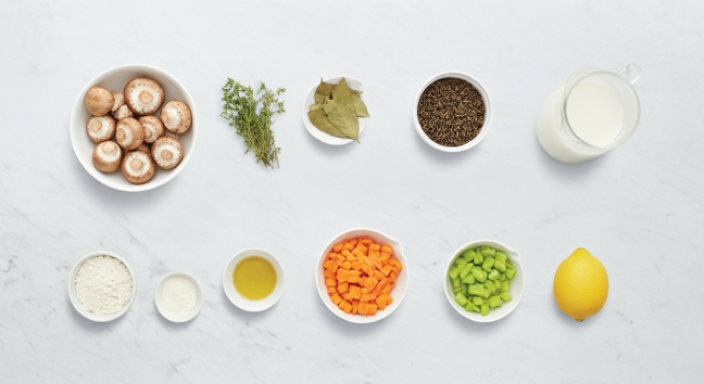 Flat lay of ingredients for mushroom and wild rice soup