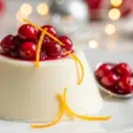 Final plated Vanilla Bean Panna Cotta with Cranberry Compote