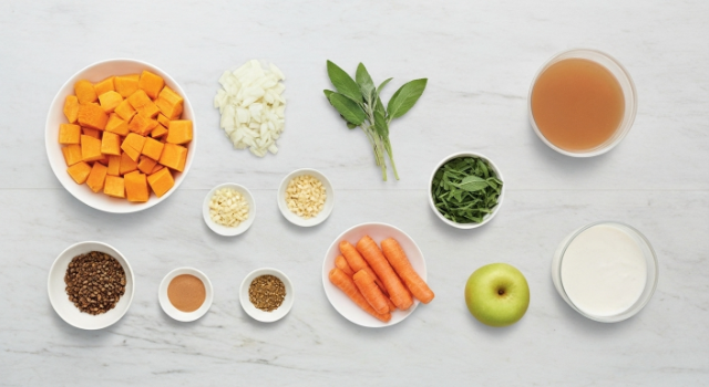 Flat lay of ingredients for butternut squash soup with sage