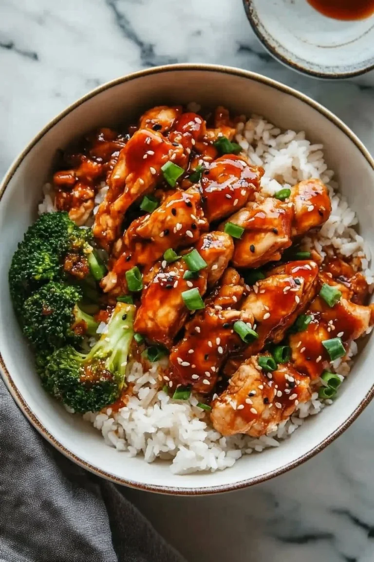 Delicious sticky chicken rice bowls served with fresh vegetables