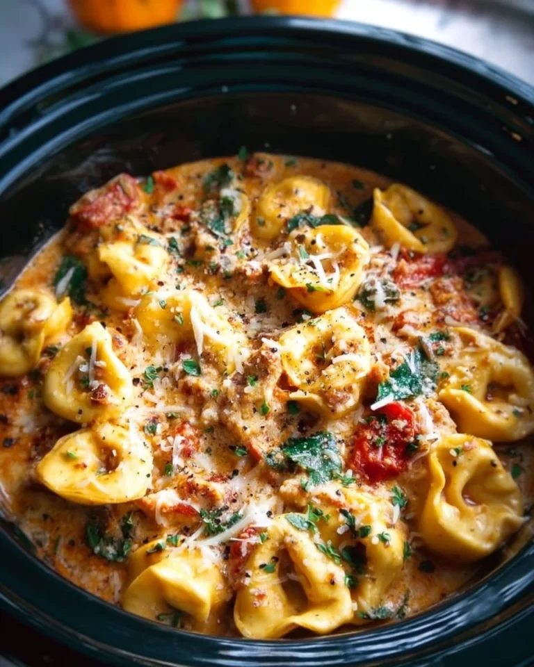 Delicious bowl of Crockpot creamy tortellini with herbs and cheese