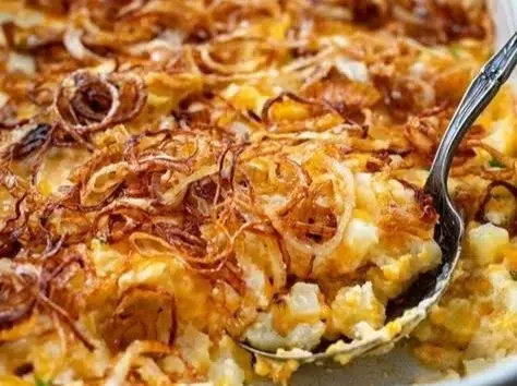 Baked French Onion Funeral Potatoes with crispy topping and creamy texture
